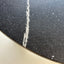 Close-up van de donkere basis en lichte aders in het Noblesse Blue Diresco blad