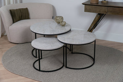 Sfeerbeeld van de Luxe composiet salontafel rond in een modern interieur