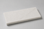 Prexory Light accessoireplank van licht natuursteen op rustige achtergrond